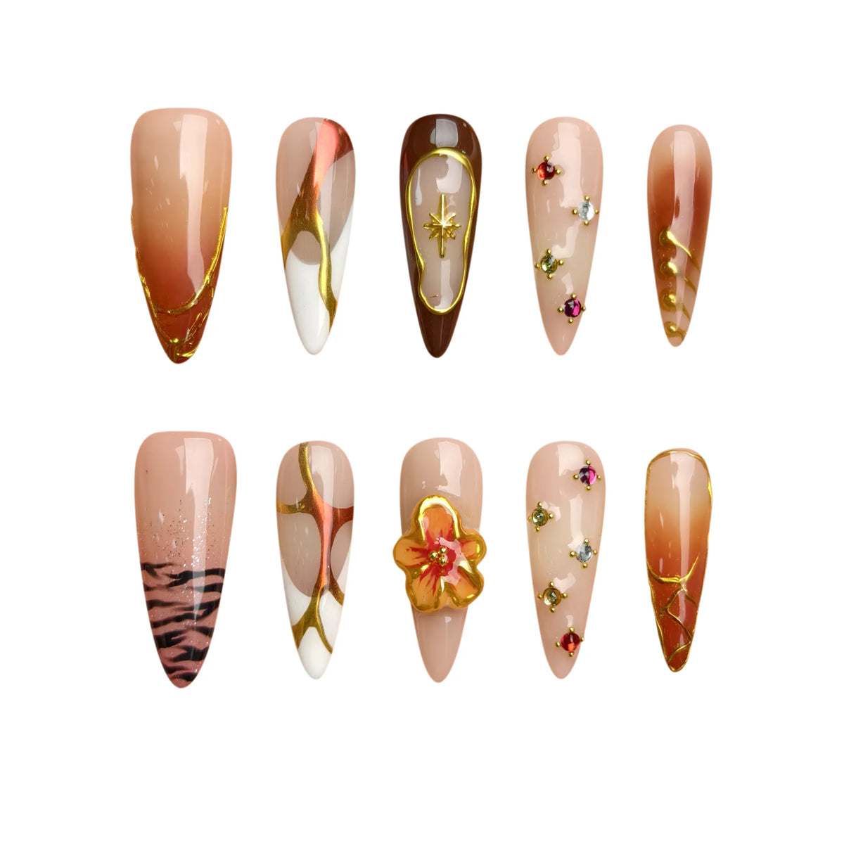Long stiletto press-on nails in bronze with gold abstract lines and floral accents, perfect for bold fashion looks.