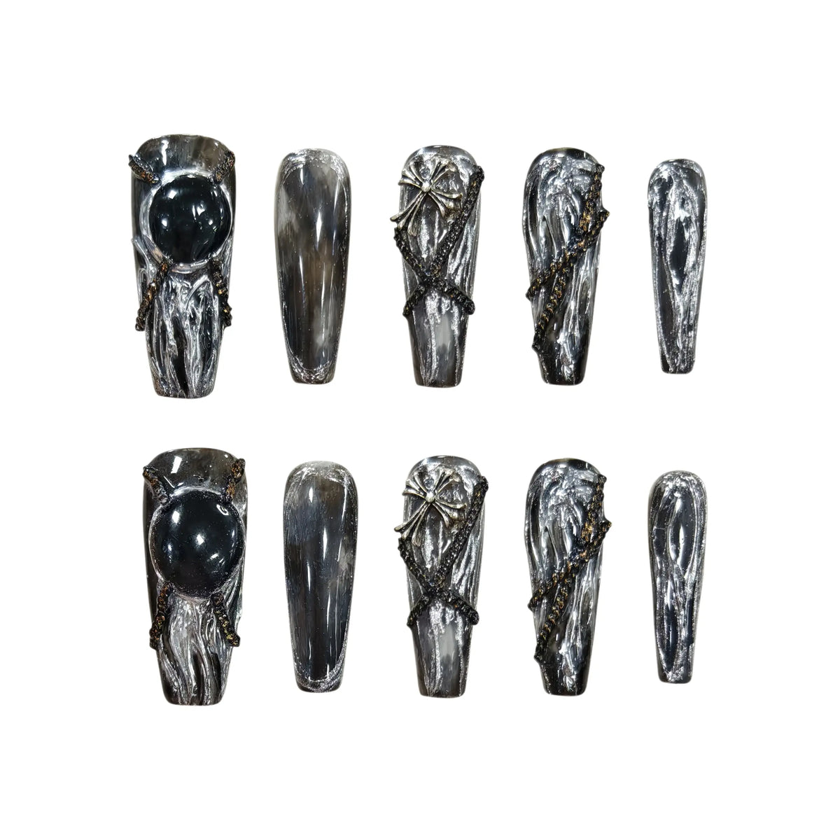Black coffin press on nails with metallic silver textures and bold 3D gemstone accents in a gothic glam style.