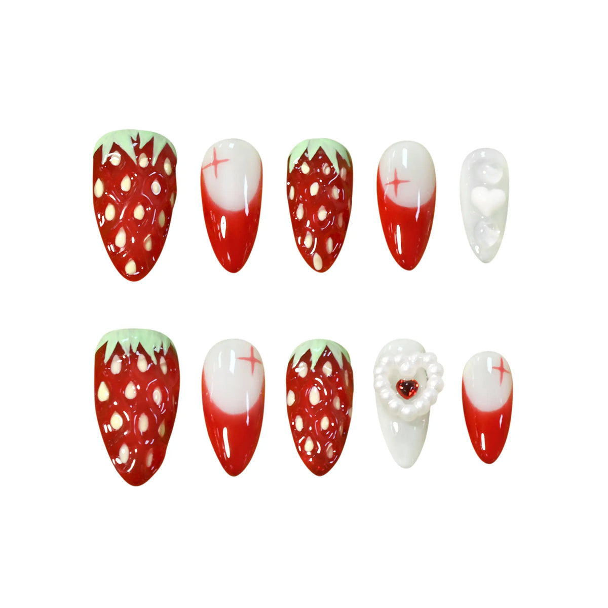 Almond-shaped red and white ombré press-on nails with 3D strawberries and pearl heart accents.
