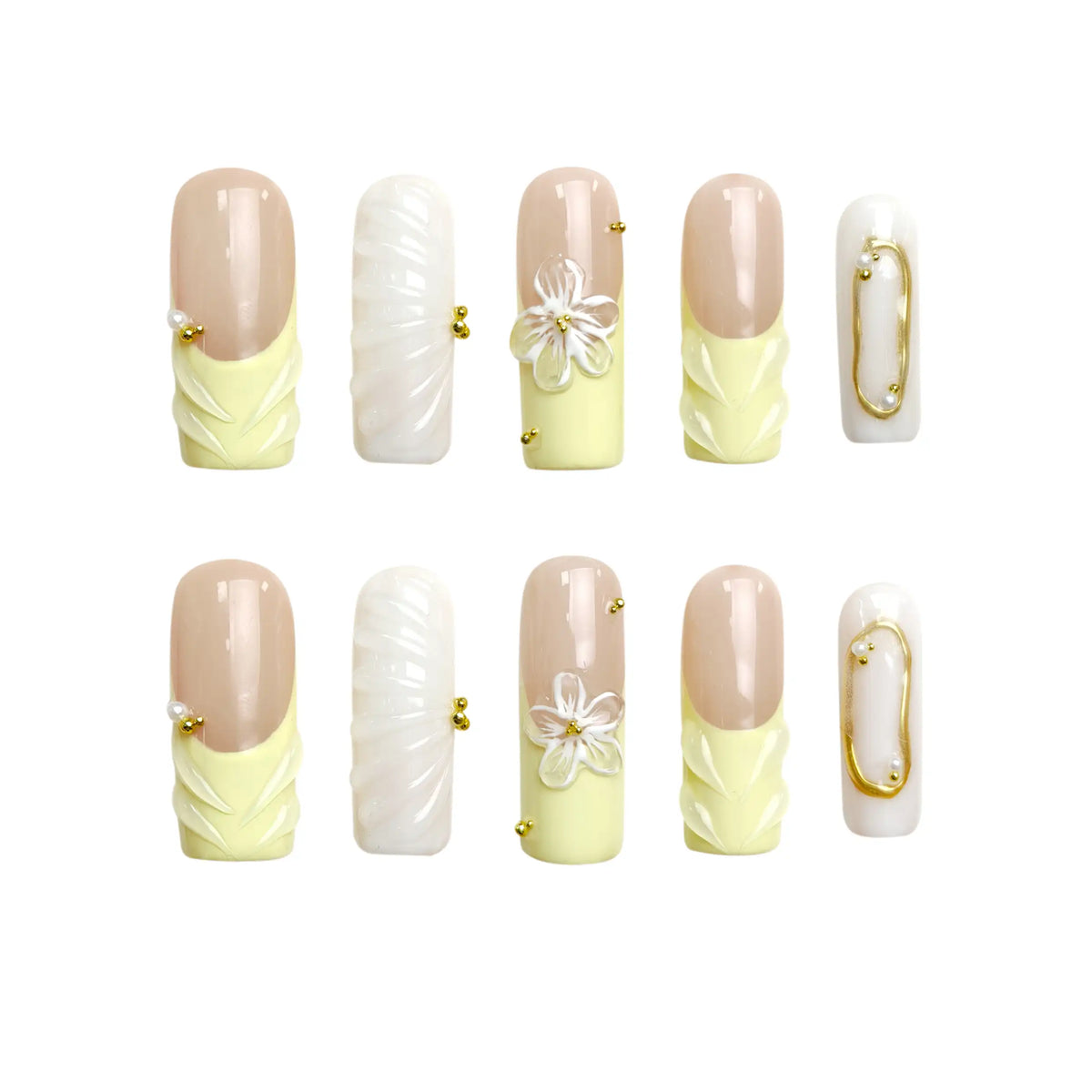 Coffin press on nails in butter yellow and white with 3D flower accents.