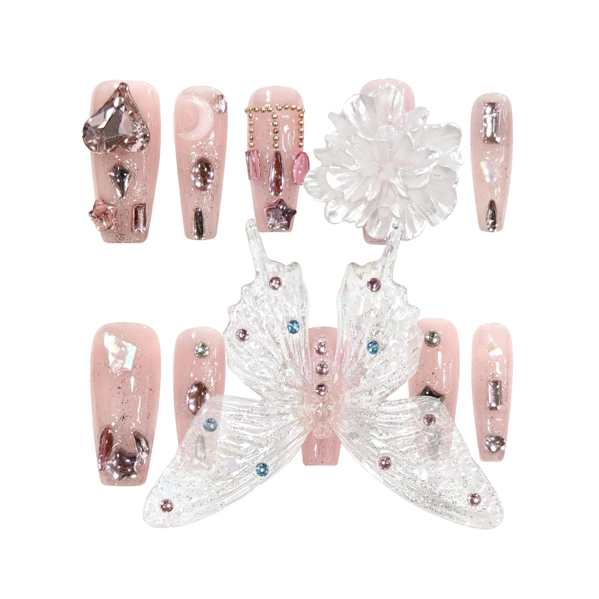 Long coffin-shaped pink press-on nails with 3D butterfly charm, chrome gems, and iridescent embellishments—perfect for summer weddings and glam events