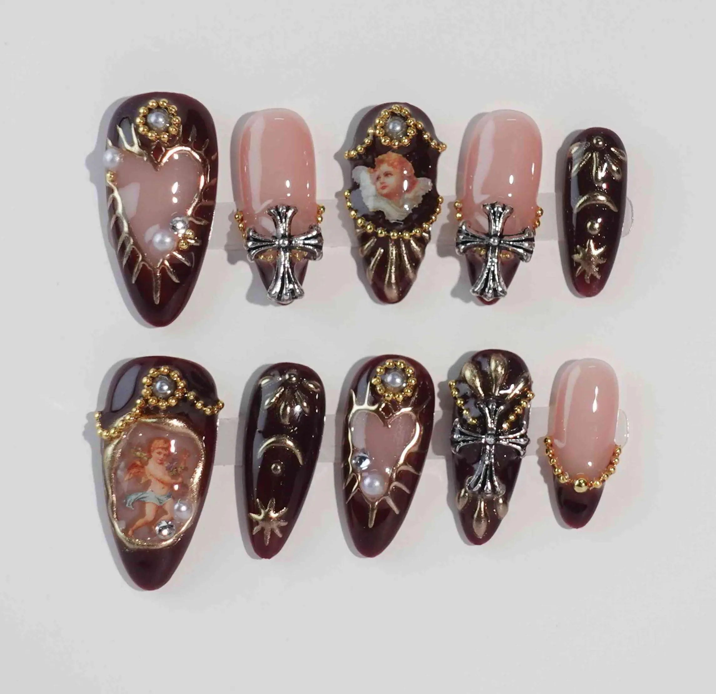 Medium almond press-on nails with celestial gemstone accents, ideal for bold night looks.