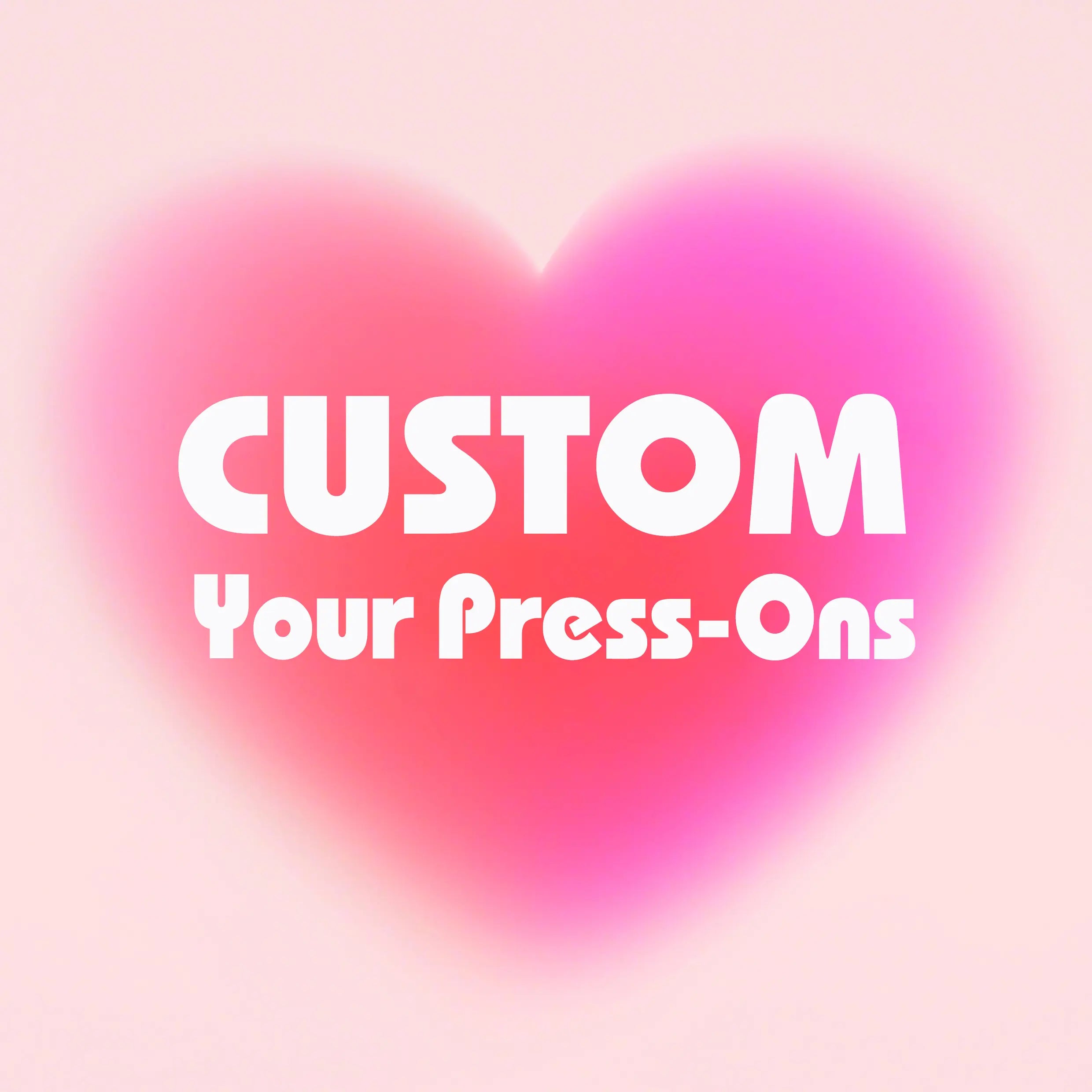 Custom press-on nails with a pink heart-filled background, showcasing personalized nail design options