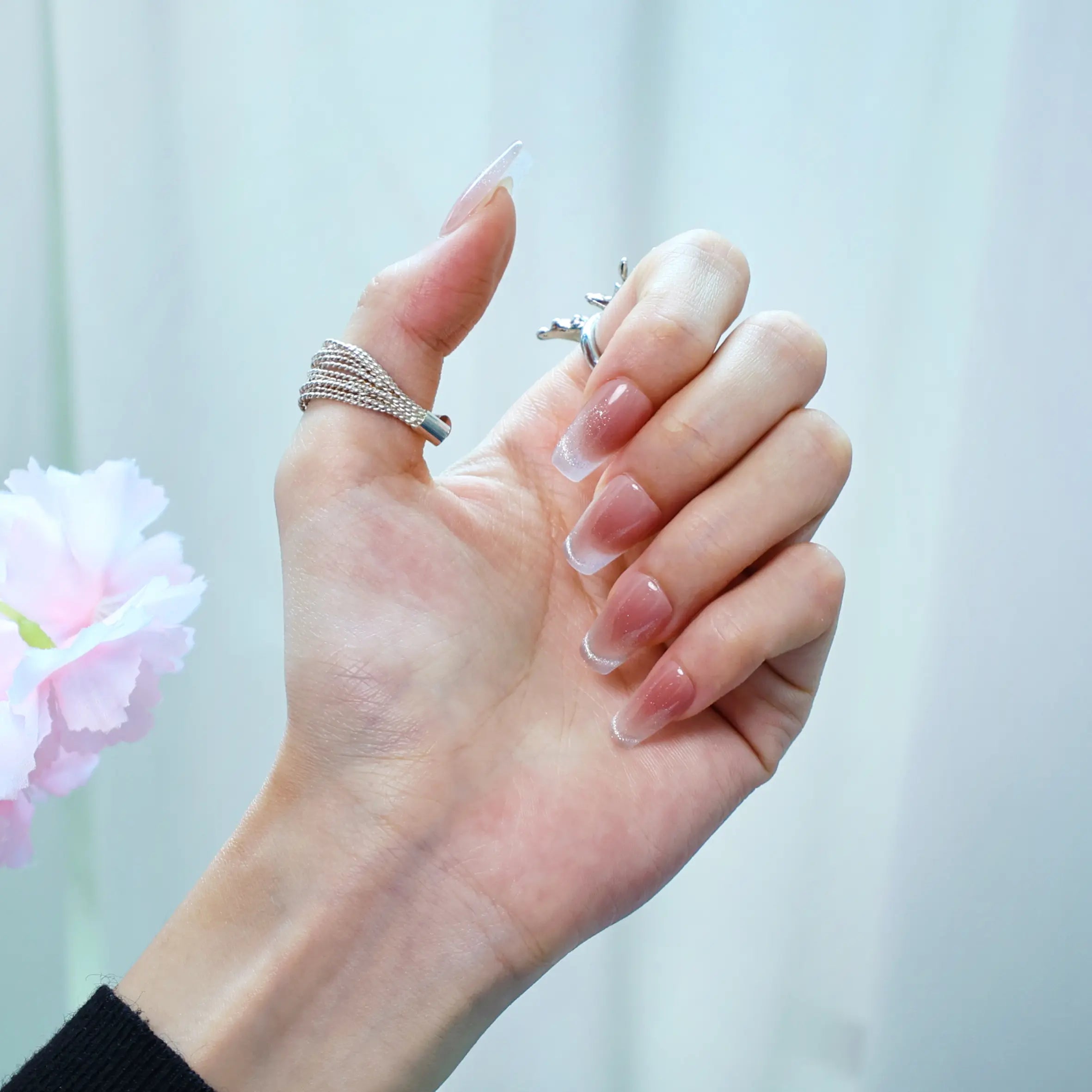 Elegant squoval nude nails with shimmer gradient design