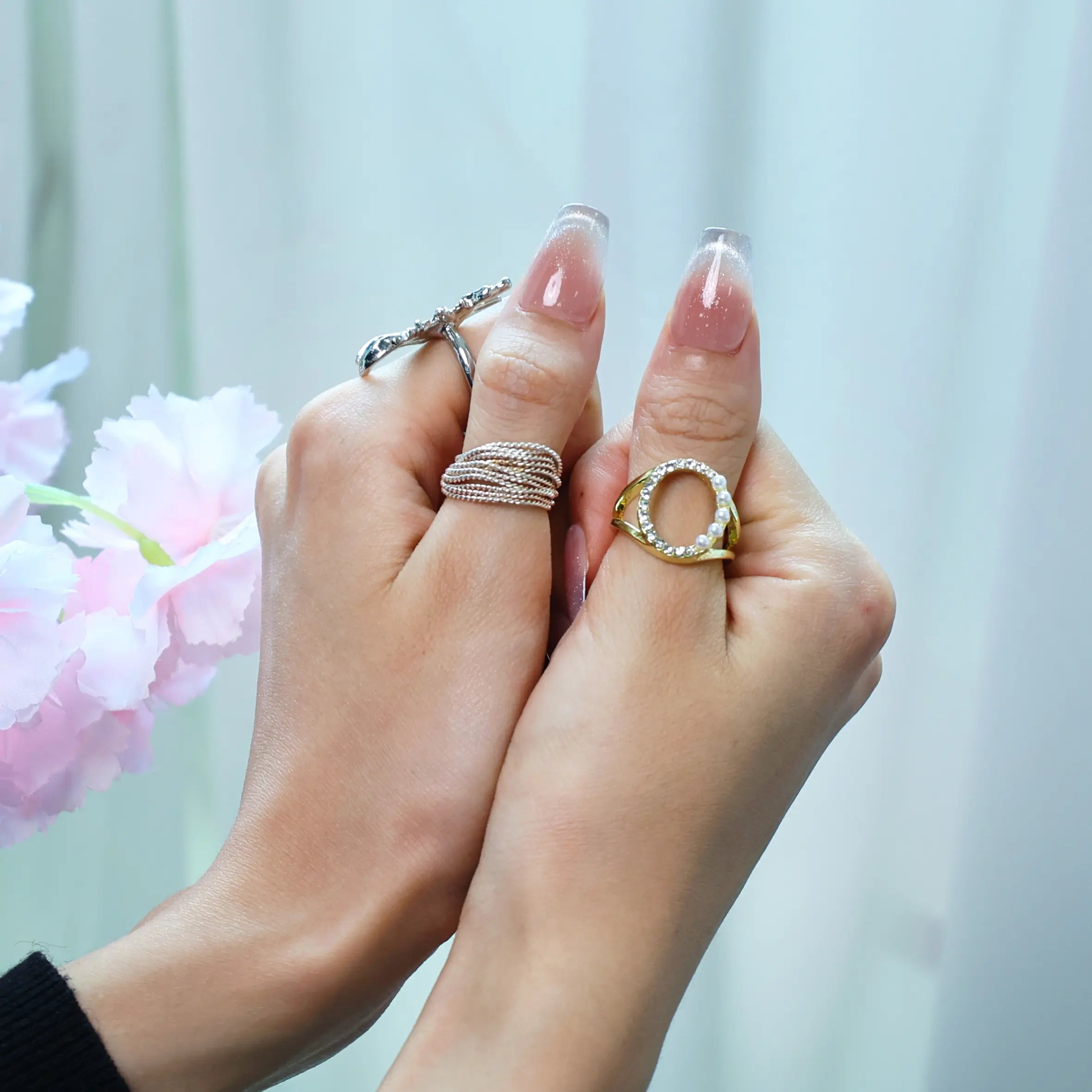 Close-up of ombré press-on nails styled for summer elegance