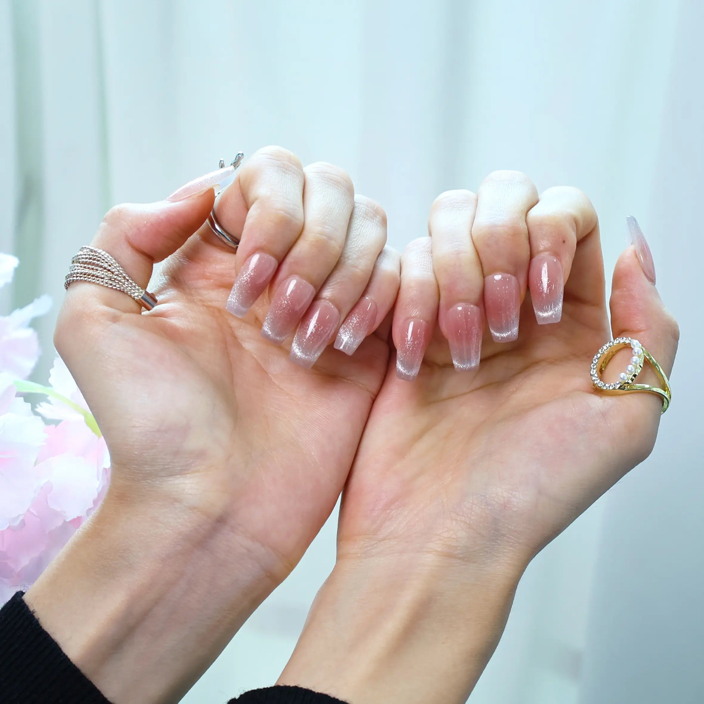 Soft beige and glitter gradient press-on nails with hand model