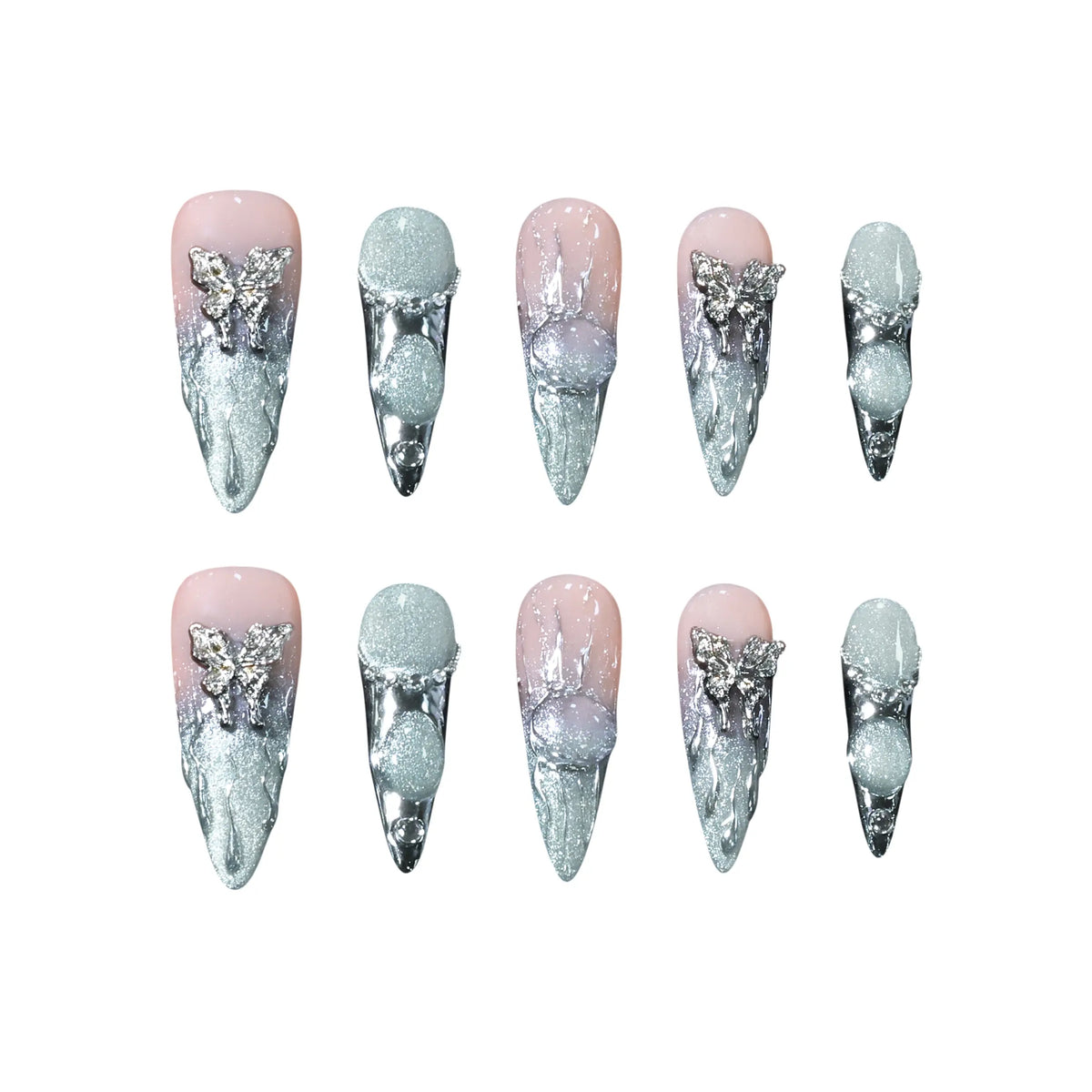 Pink stiletto-shaped press-on nails blending into silver chrome, with 3D ice textures, pearls, and metallic butterfly accents.