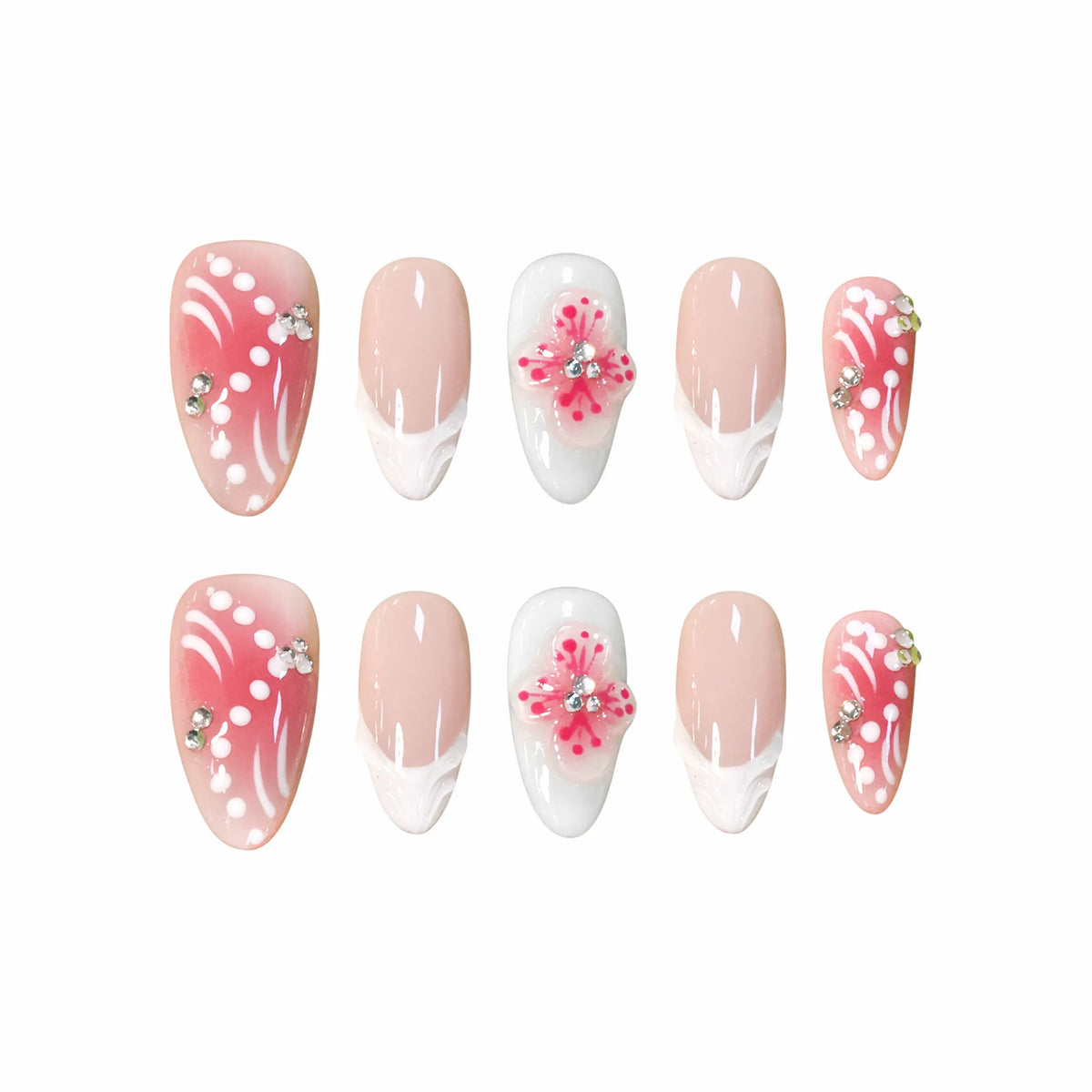 Medium pink almond press-on nails with French tips, 3D flowers, and rhinestones.