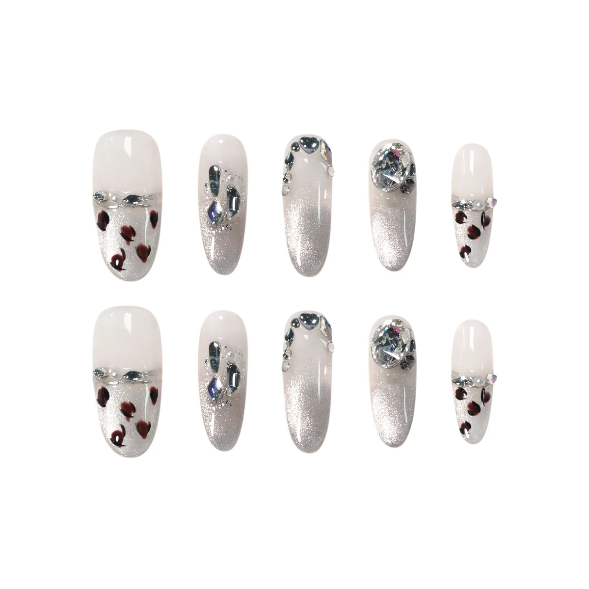 Long oval press on nails with sheer base, silver glitter ombré, and heart-shaped leopard spot accents for a bold summer glam style