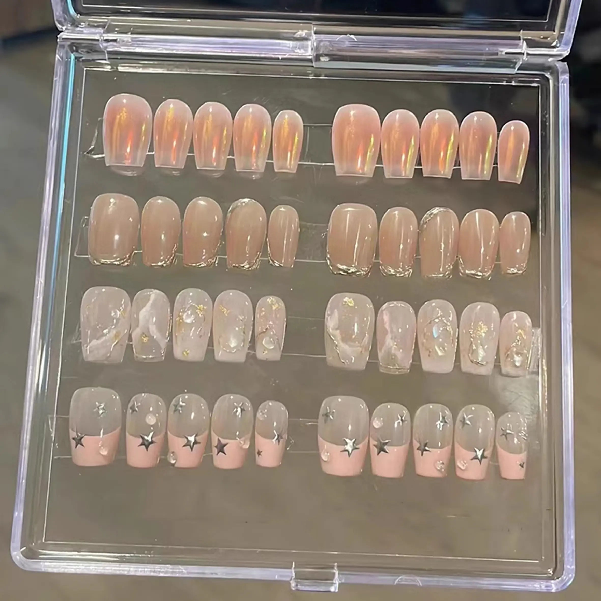 Clear Polippie nail collector box for organizing handmade press-on nails, 12x12cm size