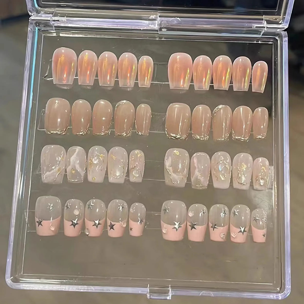 Clear Polippie nail collector box for organizing handmade press-on nails, 12x12cm size