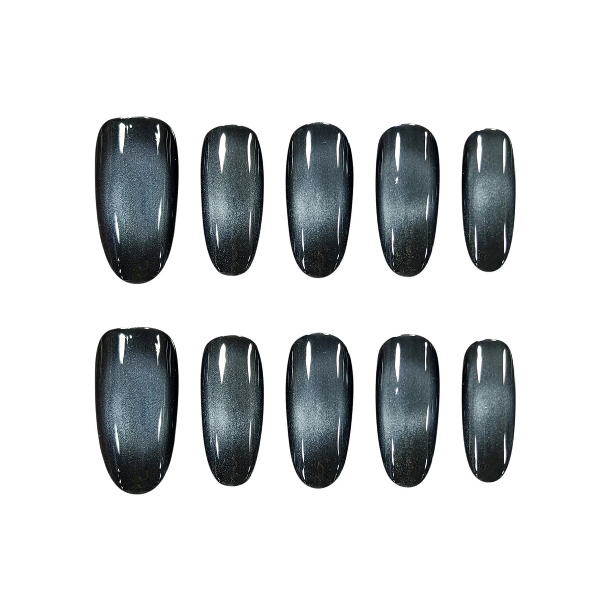 Medium squoval press on nails in black and silver gradient with a sleek, edgy finish for minimalist glam.