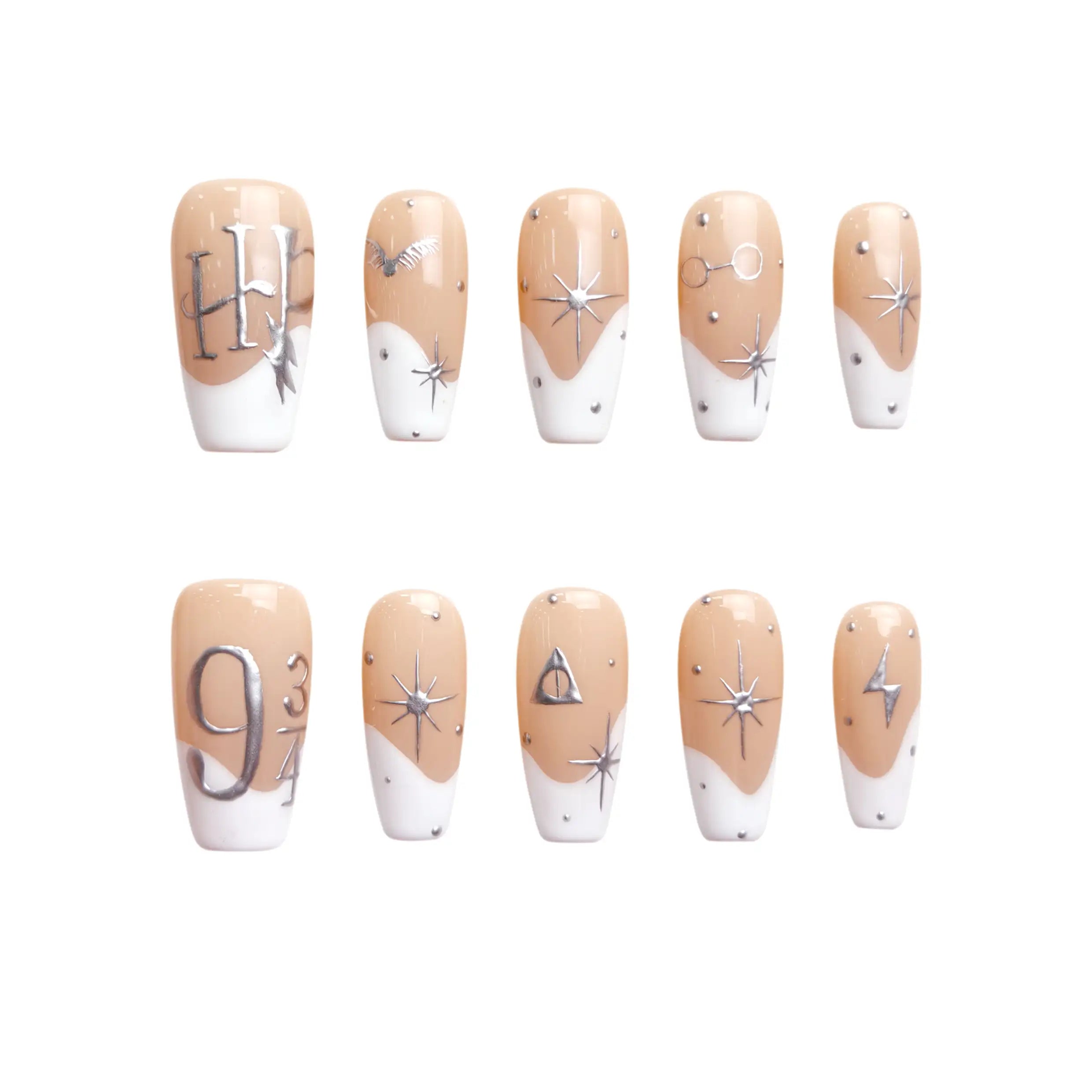 Coffin press on nails with nude base, silver star accents, and astrology symbols.