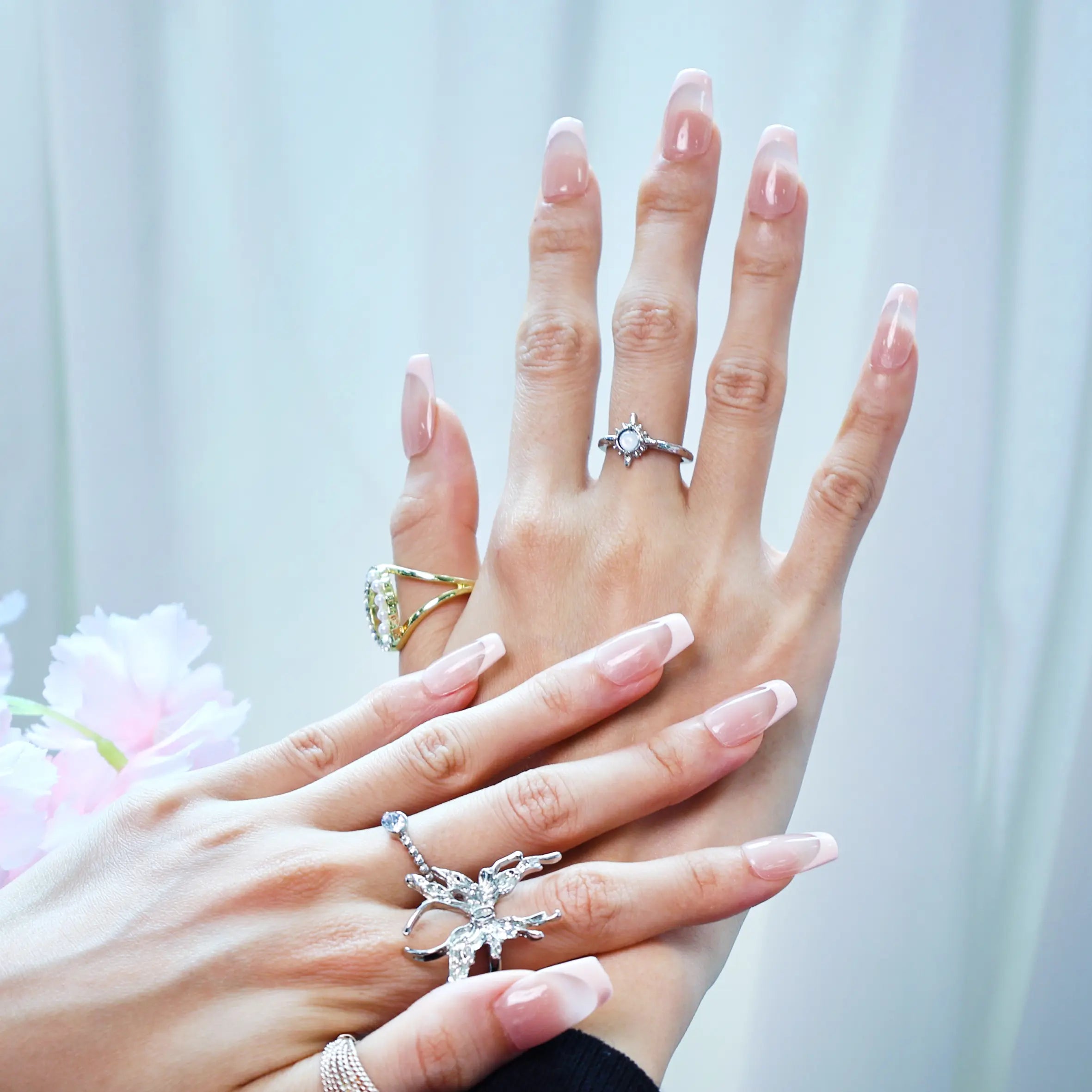 Delicate pink-accented nails perfect for bridal or daily looks