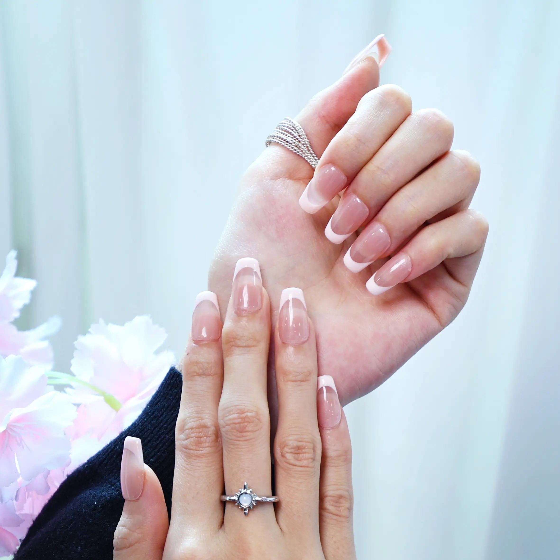 Blush-toned press-ons with modern French pink tips