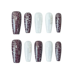 Long coffin press on nails with red and silver crackle design, bold winter nail look.