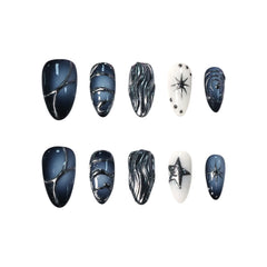 Medium blue almond press-on nails with silver chrome swirls, white gradient accents, and 3D ripple textures for a cosmic, futuristic look.