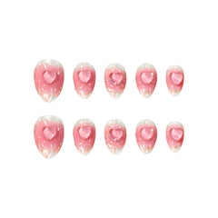 Almond-shaped pink press-on nails with jelly hearts and shimmer accents.