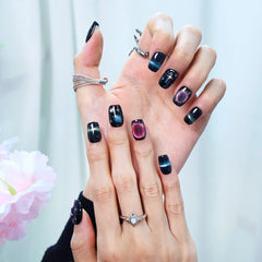 Short galaxy-themed squoval nails with cosmic sparkle