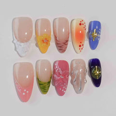 Handmade almond press-on nails with coral and pink ombré gradients, gold details, and 3D floral accents—perfect for summer vacations.