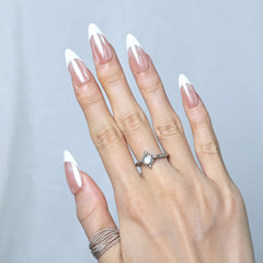 Side view of long French tip nails in neutral tones, perfect for weddings or workwear