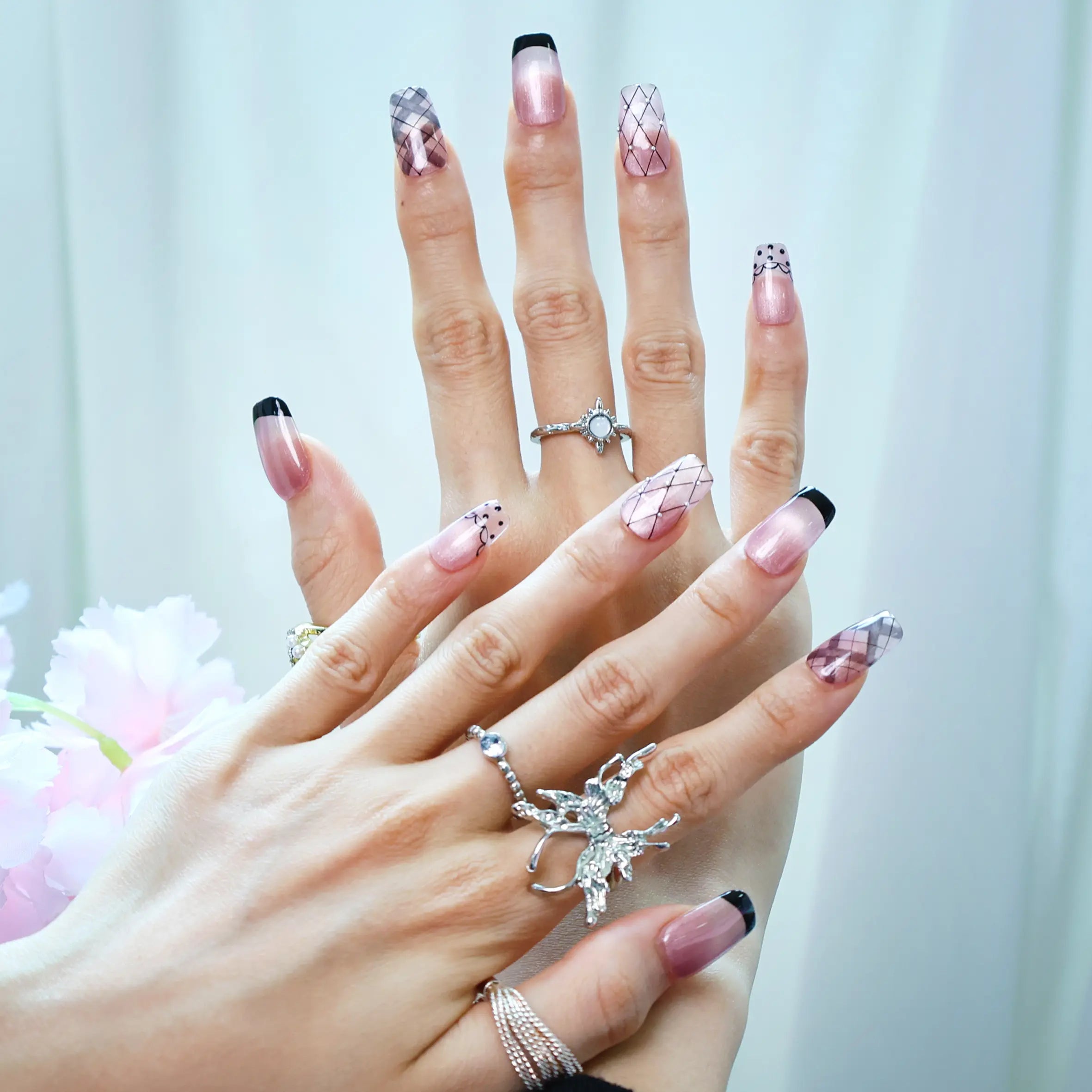Elegant press-on nails with dusty pink and soft shimmer finish