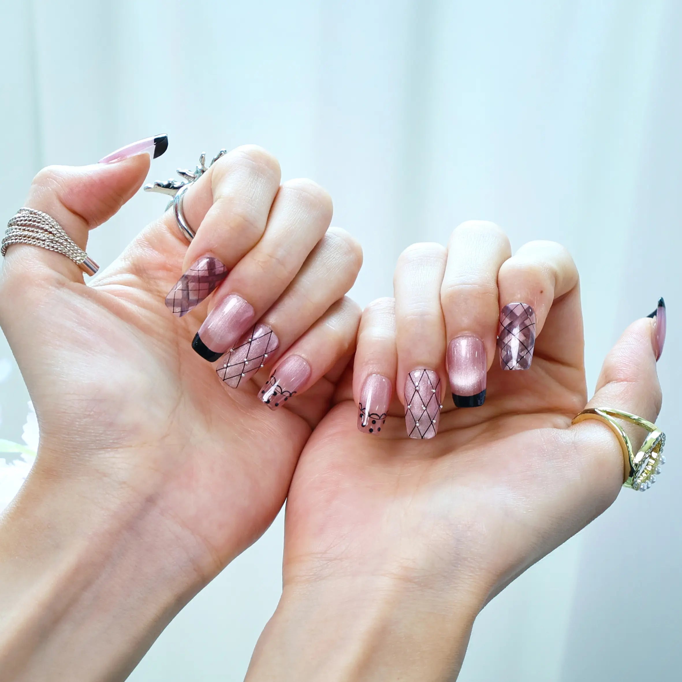 Soft-touch press-on nails styled with minimal jewelry